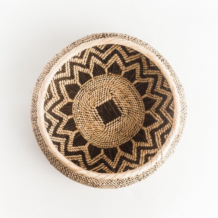 Tonga fruit basket made of natural fibers. Measures 10" wide and 5" tall. Made by Batonga women for Creative Women.