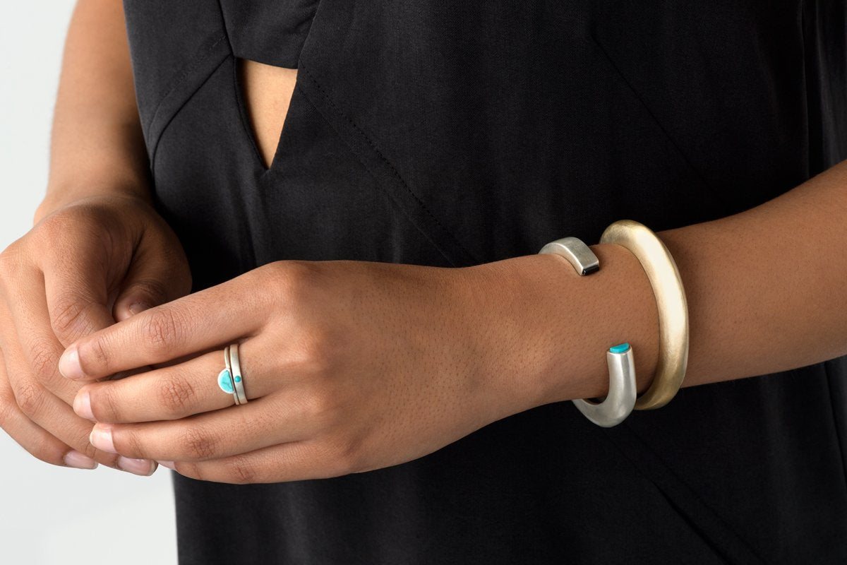 Sterling Silver Sisa ring with Kingman turquoise on model