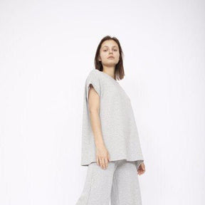 Flowy short sleeve tunic top in Heather Grey with a left side slit. Fabric and top made in Los Angeles, CA by Corinne Collection.