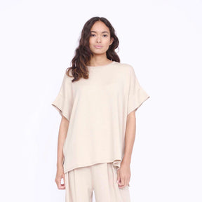 Oversized tunic style top with side slits. The Eleanor Tunic in Hazelwood is designed by Corinne Collection and made in Los Angeles, CA.