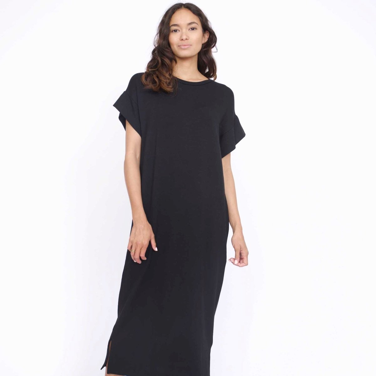 Short sleeve midi dress with side slits in Black. Fabric and dress made in Los Angeles, CA by Corinne Collective.