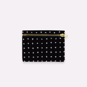 Square cross-stitch coin purse in the color Charcoal. Designed by Anchal in Louisville, Kentucky and made in Ajmer, India.