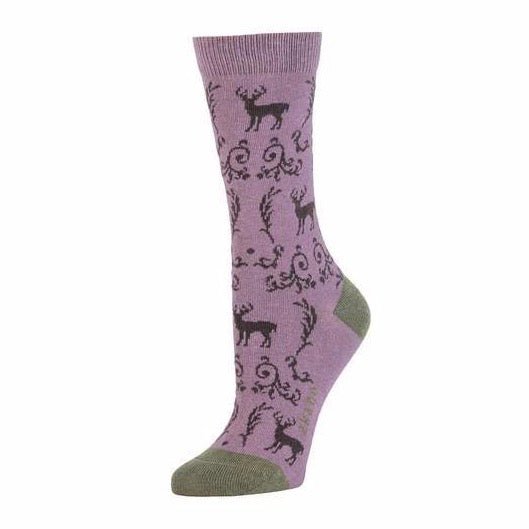 Light purple crew sock with dark purple deer and leafy embellishment design. Heel and toe are a moss green, as well as the logo along the arch. The Deer Toile Crew Sock in Amethyst is from Zkano and made in Alabama, USA.