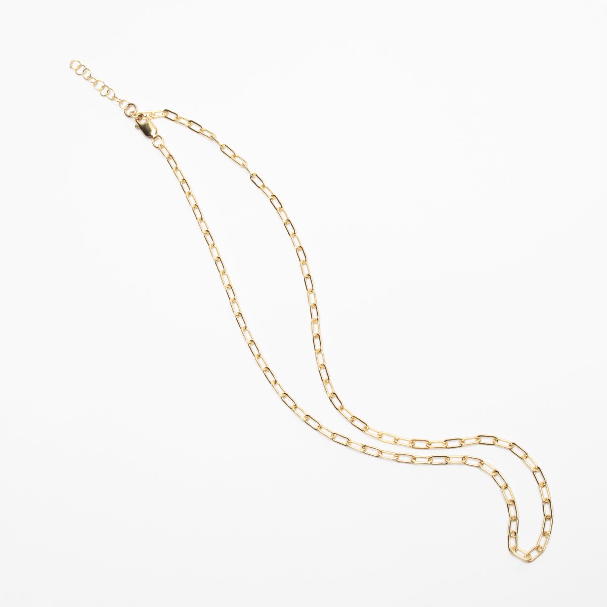 A chain link gold-fill choker style necklace. The Gold-fill Oval Layering Choker is designed and handcrafted by Deivi Arts Collective in Vancouver, Canada.