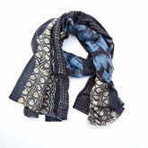 Hari scarf from Ichcha. 25% silk and 75% cotton. Shades of blue in a block printed pattern. Designed by Ichcha and handmade in India.