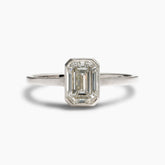Honos ring in a 14K recycled white gold band with an emerald cut lab-grown diamond (1.1 ct).