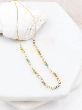 String of turquoise and gold-fill seed beads connected by gold-fill links. Designed and handmade by Amy Olson in Portland, Oregon.