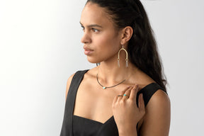 Inti necklace in bronze on model