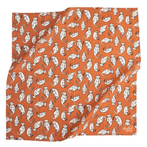Orange Bandana with  illustrations of white cats. Designed by Hemlock Goods in Fulton, MO and screen printed by hand in India. 
