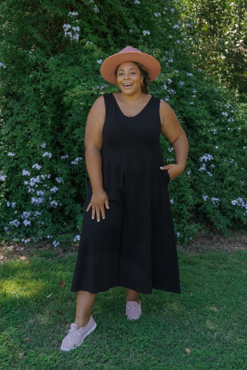 Relaxed sleeveless midi-length jumpsuit with pockets in the color True Black. The Lakeside Jumpsuit is designed by Mien and made in Los Angeles, CA.