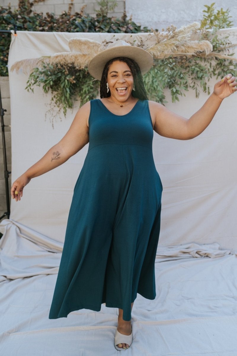 Relaxed sleeveless midi-length jumpsuit with pockets in the color Rich Teal. The Lakeside Jumpsuit is designed by Mien and made in Los Angeles, CA.