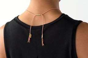 Back of Lucero necklace on model
