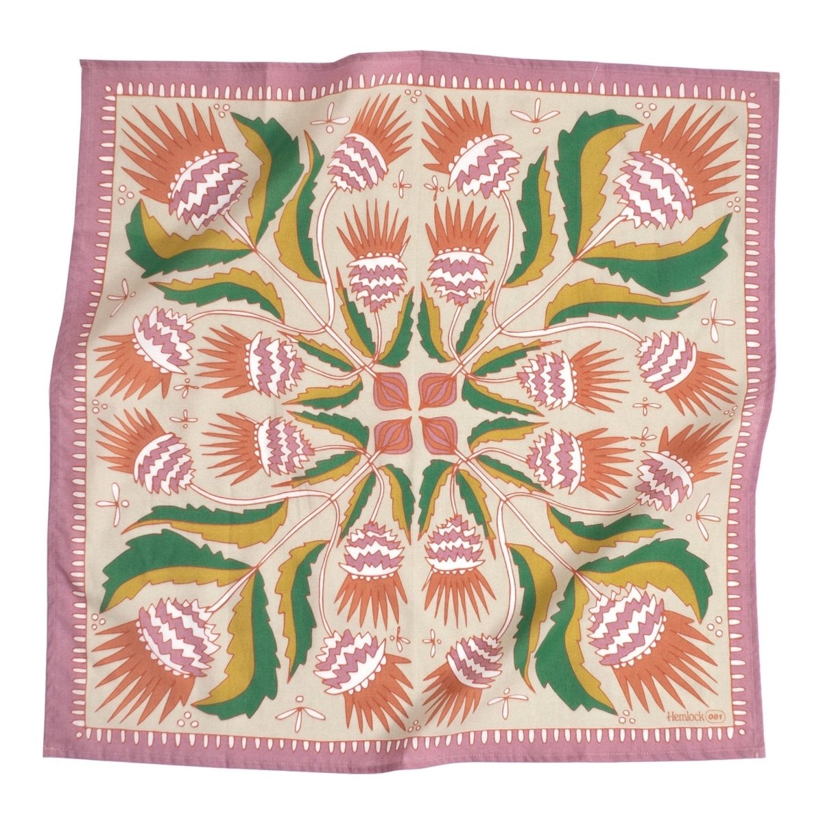 A pink, green, red and yellow bandana with floral and leaf illustrations. Designed by Hemlock Goods in Fulton, MO and screen printed by hand in India.