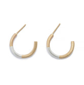 Minimalist, lightweight, mixed metal hoops of 14k yellow gold and sterling silver hand-forged wire, with 14k gold earring posts. Mini size, five-eighth inches in diameter. Hand-crafted in Portland, Oregon.
