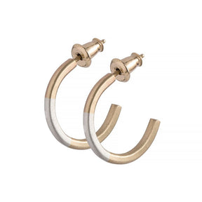 Minimalist, lightweight, mixed metal hoops of 14k yellow gold and sterling silver hand-forged wire, with 14k gold earring posts and ear nuts. Mini size, five-eighth inches in diameter. Hand-crafted in Portland, Oregon.