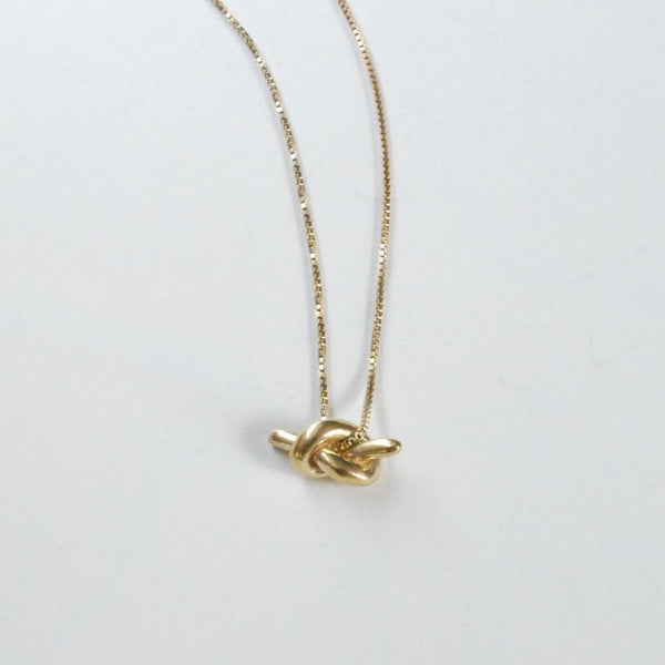 Knot in necklace on sale chain