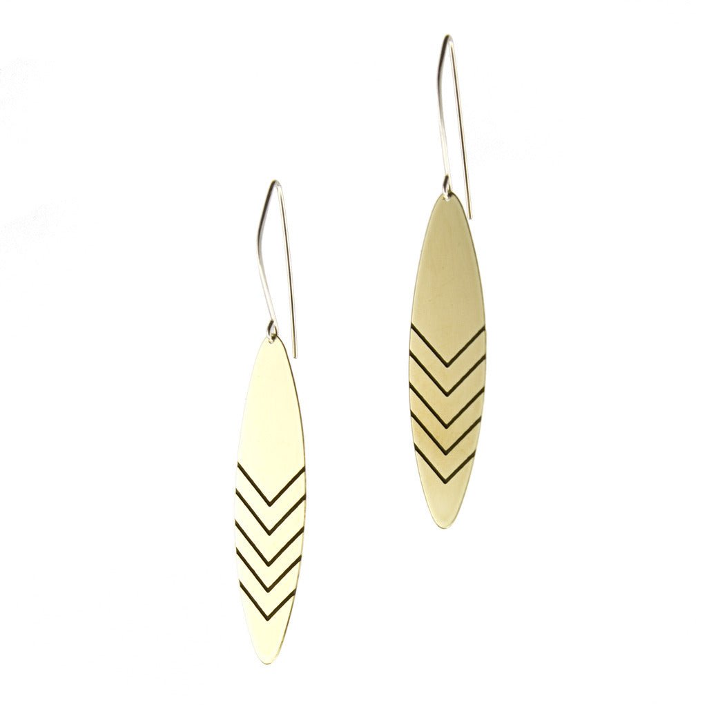 Brass earrings with cascading chevron patterns by betsy & iya.