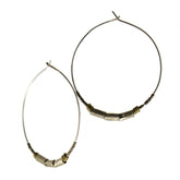 betsy & iya Colubrina Hoop earrings.