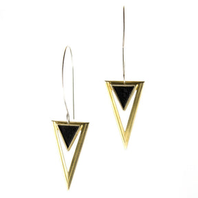 Lightweight, fierce earrings with brass and inset black triangles.