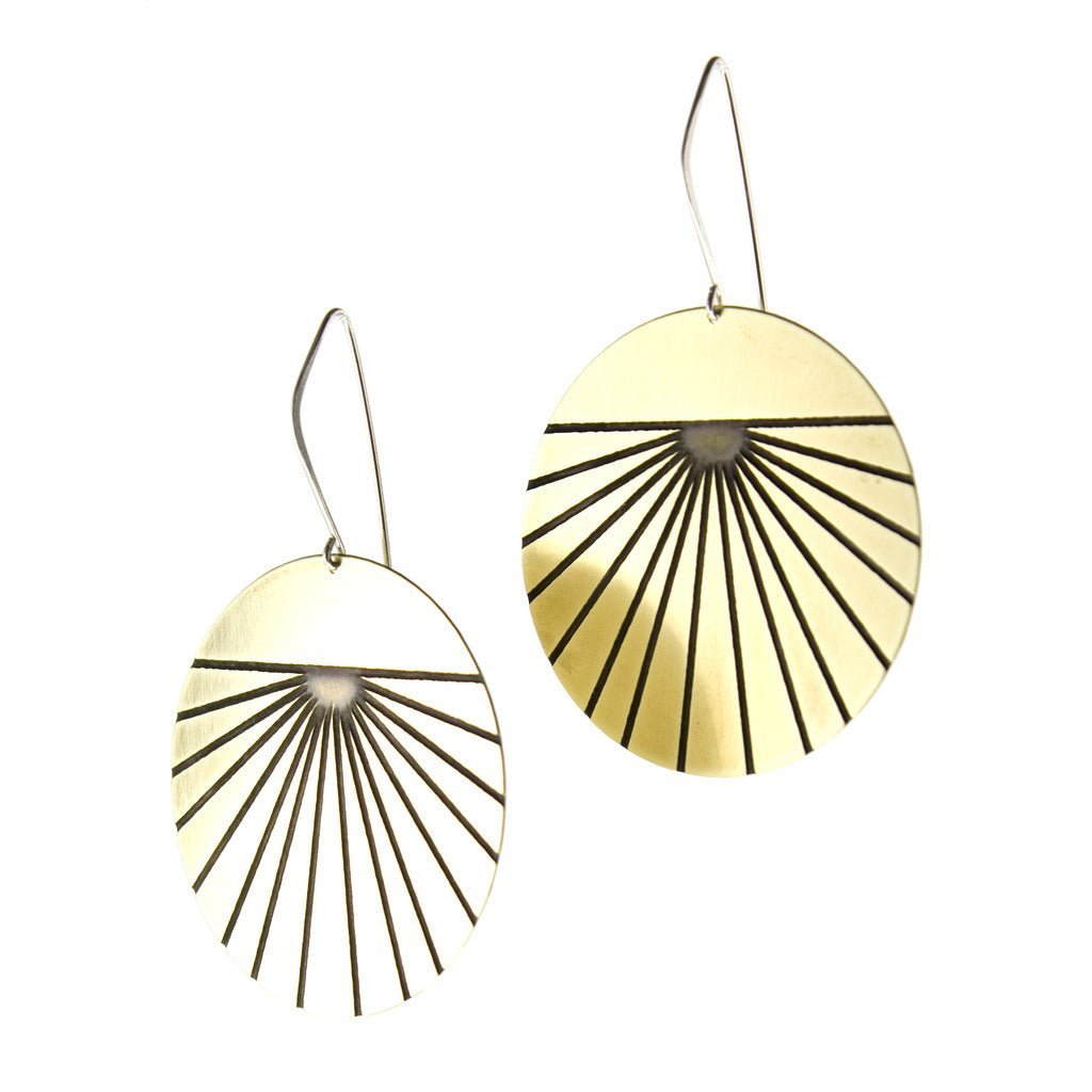 Large modern gold circle earrings with black lines and sterling silver findings.
