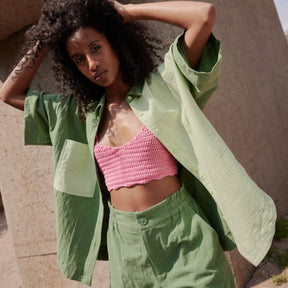 A two tone button up in a moss green and a light green with a light green pocket. The Pandora Shirt in Lime & Matcha is designed by Eve Gravel and made in Montreal, Canada.