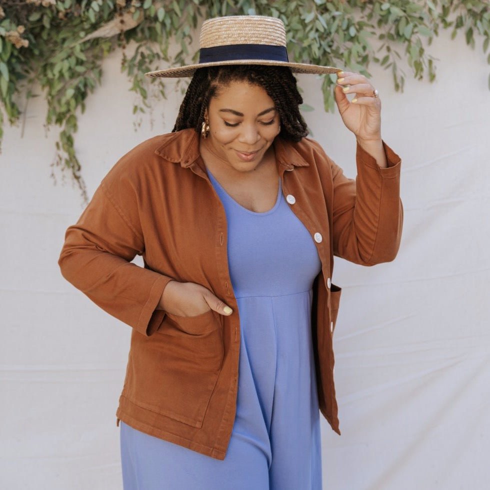 Chore jacket with off-white buttons and two oversized pockets in the color Saddle Brown. The Painter's Jacket is designed by Mien and made in Los Angeles, CA.