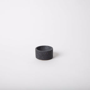Terrazzo incense holder in the shade black. Holds a single stick of  incense. Made by Pretti.Cool in Houston, Texas. 