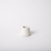 Terrazzo concrete matchstick holder in the shade white. Made by Pretti.Cool in Houston, Texas.