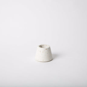 Terrazzo concrete matchstick holder in the shade white. Made by Pretti.Cool in Houston, Texas.
