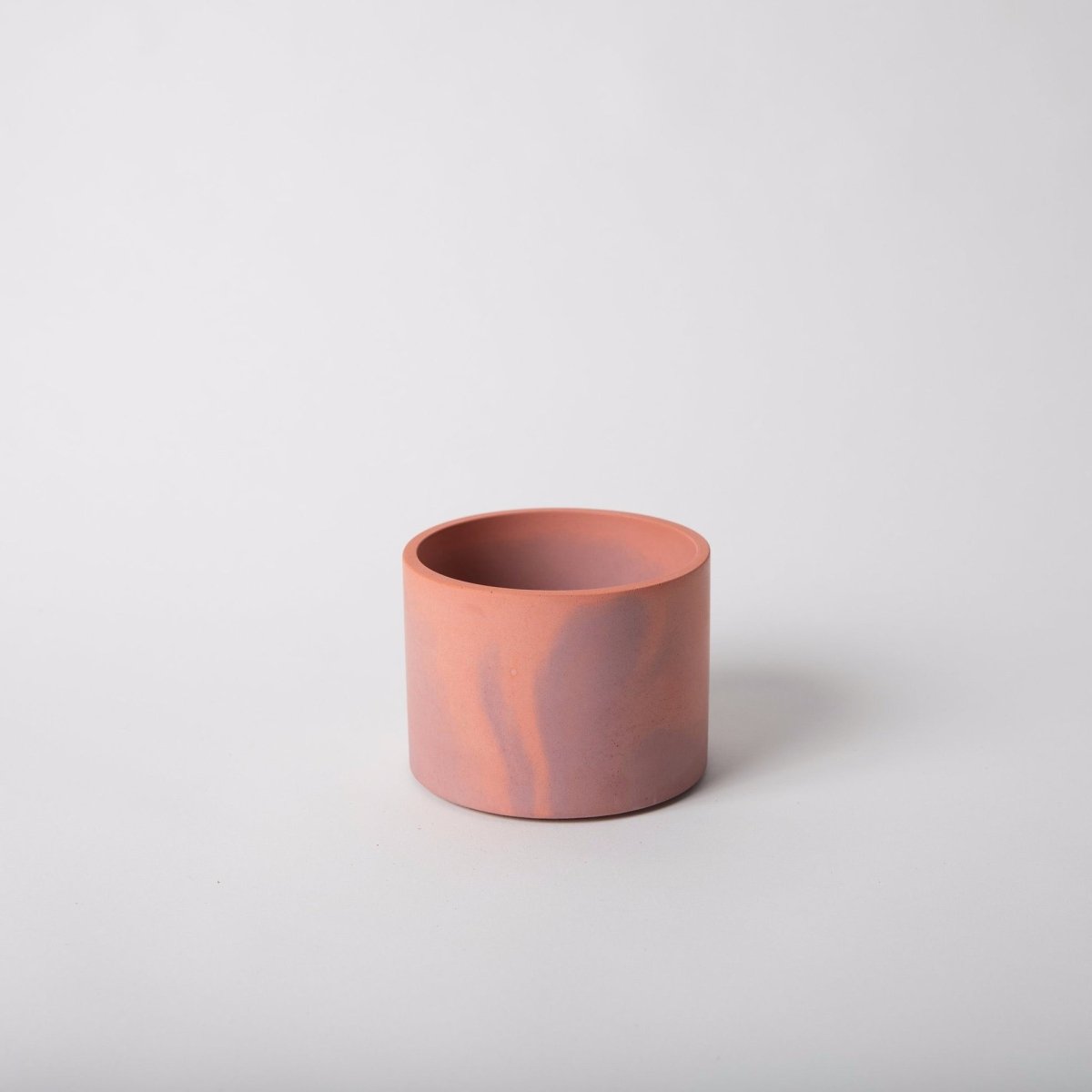 Four inch vessel in the shade pink + mauve. Made by Pretti.Cool in Houston, Texas.