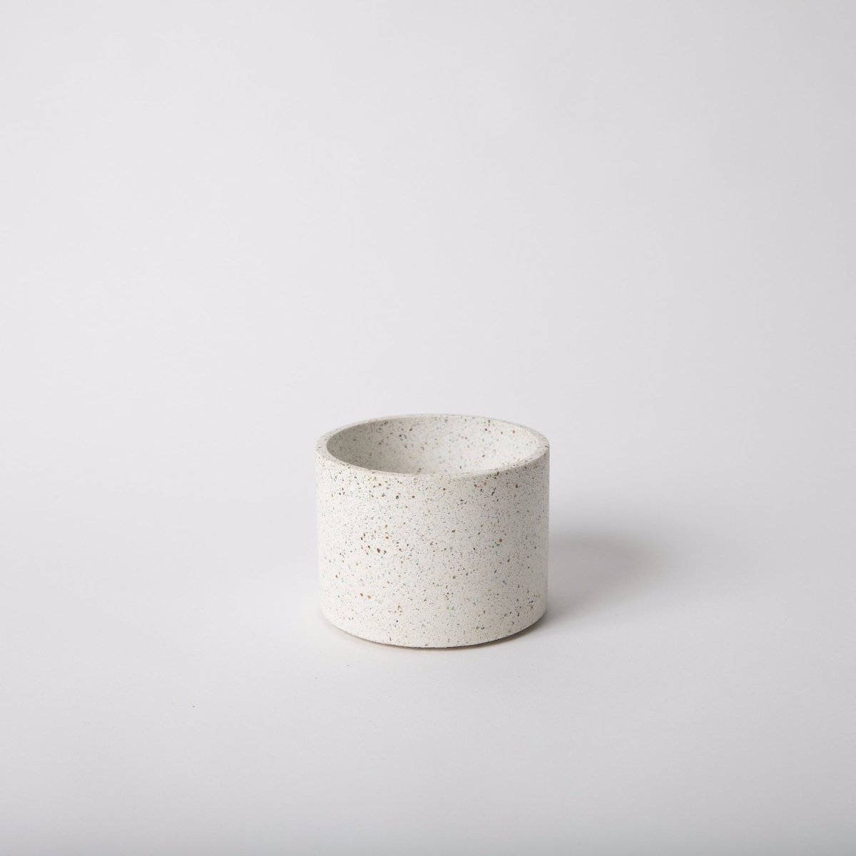 Four inch vessel in the shade white terrazzo. Made by Pretti.Cool in Houston, Texas.