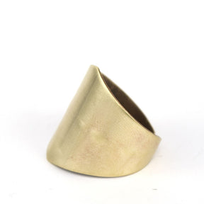 Gold wide band brass metal ring.