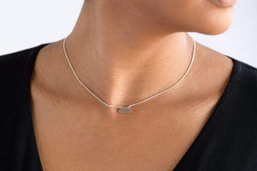 Ritmo mini fan necklace in sterling silver on model