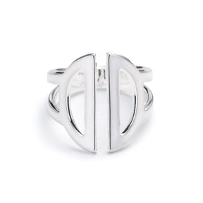Wide, adjustable, polished silver ring, featuring two triangular cutouts on the band and a pair of semicircle cutouts as the focal point. Hand-crafted in Portland, Oregon. 