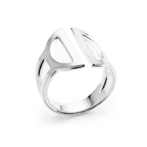 Wide, adjustable, polished silver ring, featuring two triangular cutouts on the band and a pair of semicircle cutouts as the focal point. Hand-crafted in Portland, Oregon. 