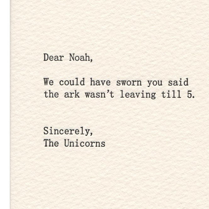 Black printed message on a Kraft card that reads: "DEAR NOAH, WE COULD HAVE SWORN YOU SAID THE ARK WASN'T LEAVING TILL 5. SINCERELY, THE UNICORNS." Card is designed by Sapling Press and printed in Pittsburgh, PA.