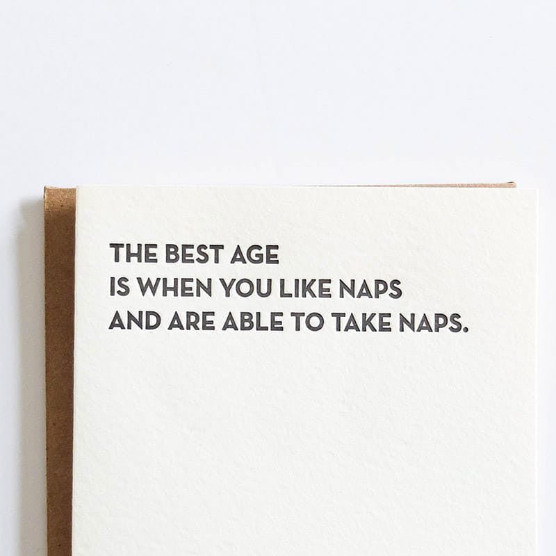 Kraft card with black text that reads: "THE BEST AGE IS WHEN YOU LIKE NAPS AND ARE ABLE TO TAKE NAPS." Designed and made by Sapling Press in Pittsburgh, PA.