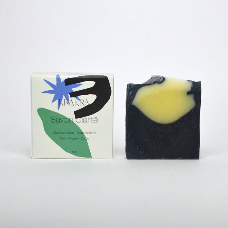 A square soap bar infused with activated charcoal and sage. Handcrafted in Bordeaux, France by Krakra cosmetics.
