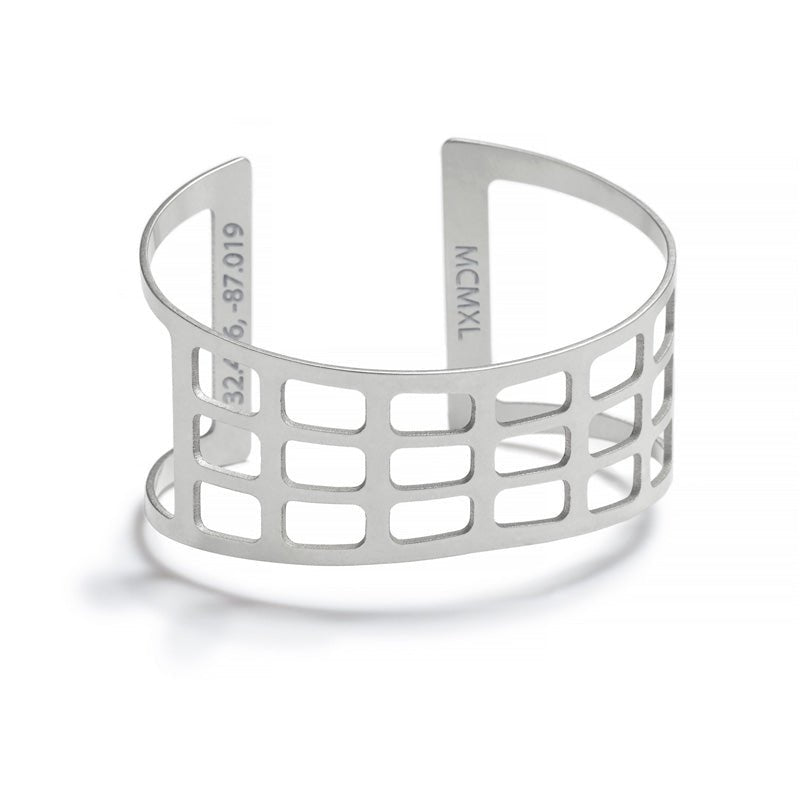 Modern, adjustable cuff of silver-plated brass, modeled after the Edmund Pettus Bridge in Selma, Alabama. Engraved on the inside with the year the bridge was completed and the bridge's geographic coordinates. Hand-crafted in Portland, Oregon.