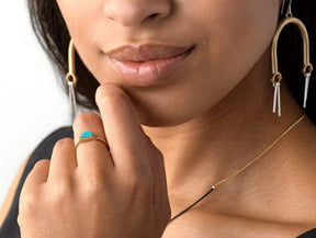 Bronze Sisa ring with Kingman turquoise on model