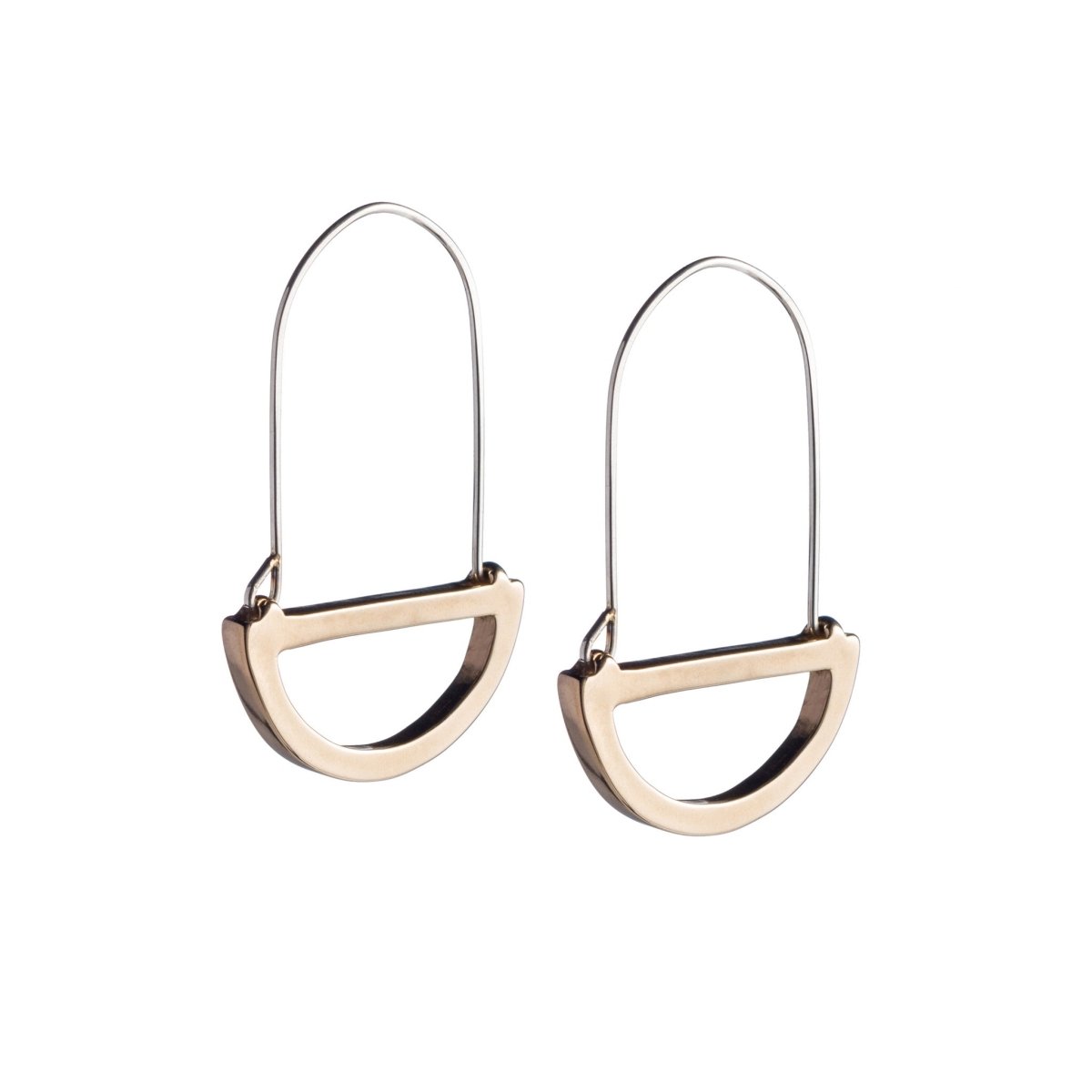 Modern, polished, cast bronze semicircle pendants hanging below long, hand-formed, sterling silver hoops. Hand-crafted in Portland, Oregon.