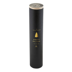 Black cylindrical packaging with a gold tree design. Contains fifty incense sticks in the scent sweet balsam. Made in Philadelphia, PA by SKEEM Design.