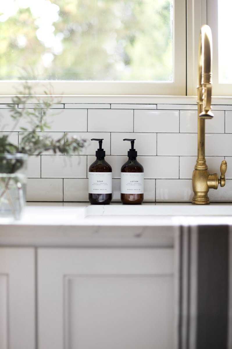 Two lotion bottles on a sink counter. The lotion is from Sydney Hale CO, and made in Richmond, Virginia. 
