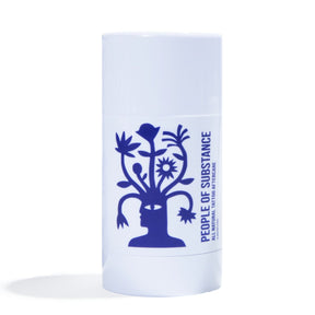 A tattoo balm in a white applicator with a navy blue design. The tattoo balm stick is designed and made by People of Substance in New York, NY.