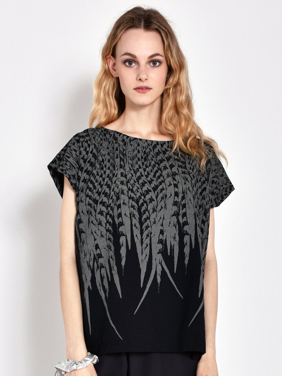 Short sleeve black tunic with grey feather design. Designed and sewn by Uzi in Brooklyn, New York.