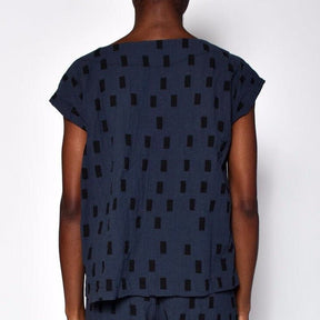 Navy blue short sleeve tunic with black square pattern. Designed and sewn by UZI in Brooklyn, New York.