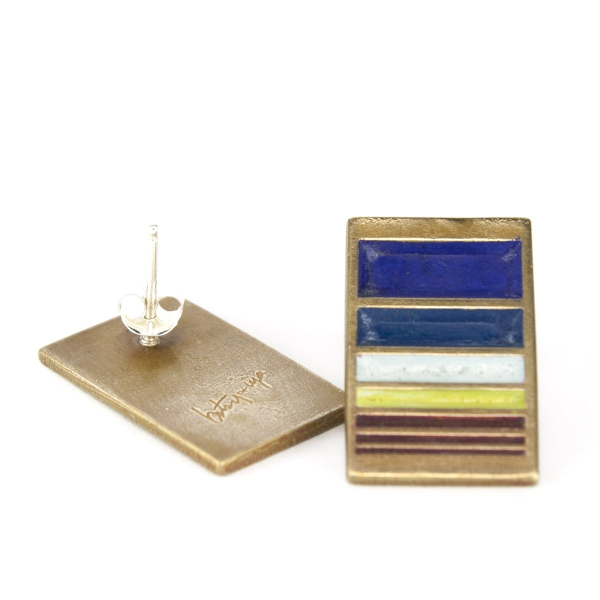 Silver and bronze painted stud earrings.