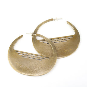 Portland made bronze earrings with cut out design.