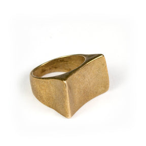 Bold bronze cocktail ring with curved rectangular top.