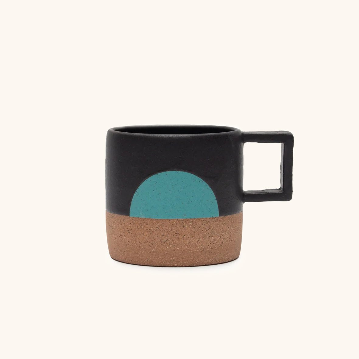 Handle Mug with black satin glaze and turquoise half moon illustration. Made in Hood River, Oregon by Wolf Ceramics.